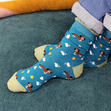 Close up of Ladies Teal mix dog themed triple sock boxed set